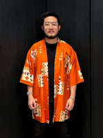 Load image into Gallery viewer, Orange Abstract Flowers Mid Length Kimono
